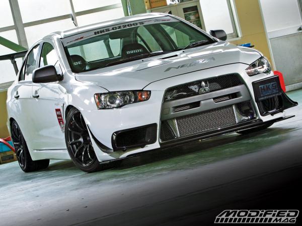 modp 0908 03 o+hks cz200s mitsubishi lancer evo x+front view